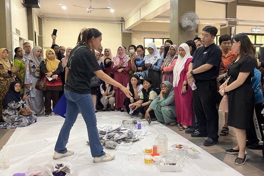 School teacher representatives learned to sort waste into different categories